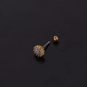 Golden flower earring with blue zircons and stainless steel post on black background