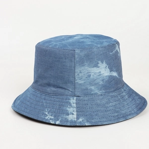 Detail of blue tie-dye cotton bucket hat featuring multi-row brim stitching for sun protection
