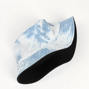 Detailed view of tie-dye bucket hat featuring reinforced stitching and dual-layer fabric