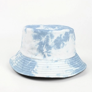 Detail of blue and white tie-dye cotton bucket hat with precision stitching and flat top