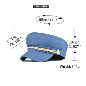 Blue corduroy newsboy hat detail showing dimensions: 58cm circumference and 5.5cm brim