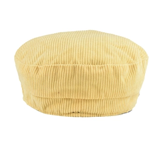 Detailed close-up of yellow corduroy beret hat with fine ribbed texture and round top