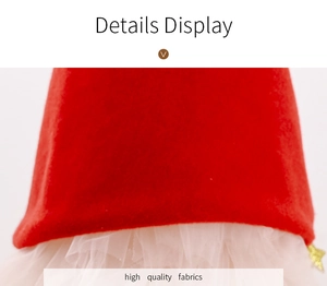 Close-up of red felt and white tulle Christmas decoration showing high quality fabrics
