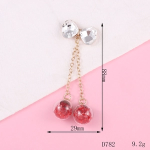Detail view of cherry bow pendant showing dimensions of 88mm length and 29mm width