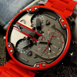Close-up of the red industrial chronograph dial with Only The Brave logo engraving