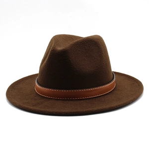 Detailed view of the dark brown wool fedora with a leather band and white stitching details