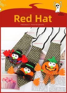 Detail of Halloween sequin ties featuring elf and pumpkin motifs with elastic straps