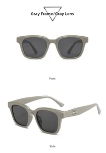 Detail view of grey square frame sunglasses with silver B logo on side and front temple