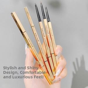 Macro detail of ultra-fine eyebrow pencil with golden metallic casing and four shade swatches