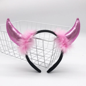Pink metallic devil horn headband with soft plush trim on a black frame for party costumes