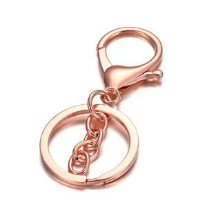 Detail of rose gold lobster clasp key ring set with high-gloss mirror polished finish