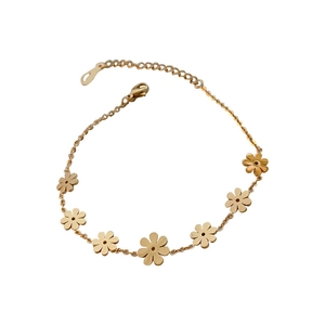 Adjustable gold titanium steel bracelet featuring multiple hollow flower charms for women