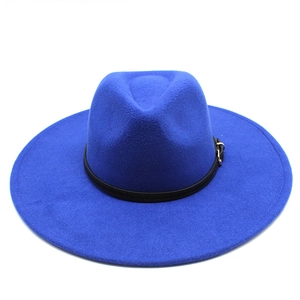 Detail of royal blue wool wide brim fedora with black leather band and gold buckle