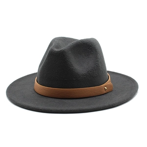 Detail of dark gray wool felt fedora featuring brown leather band and gold rivet accents