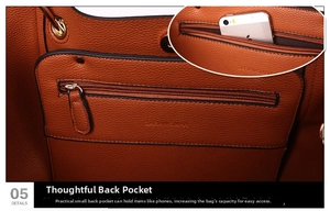 Detail view of the brown leather tote rear zipper pocket with a metal magnetic closure