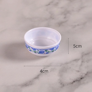 Miniature blue and white porcelain bowl for dollhouse DIY with floral pattern details