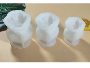 Three-piece set of white tulip-shaped silicone molds for DIY candles and handmade soap
