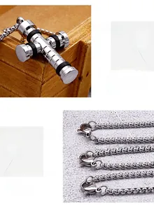 Détail du pendentif croix argentée avec fermoir mousqueton et chaîne à maillons carrés
