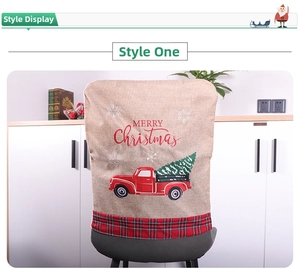 Detail of Christmas burlap chair cover with red vintage truck and snowflake pattern