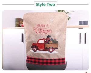 Detail of Christmas chair cover with red vintage truck and buffalo plaid border