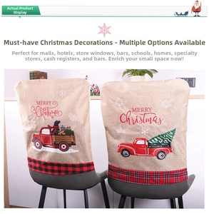 Detail of burlap Christmas chair covers with red truck print and festive plaid borders
