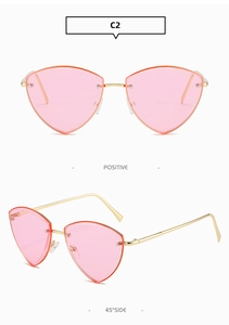 Vue détaillée des lunettes de soleil sans monture roses en cœur avec branches dorées