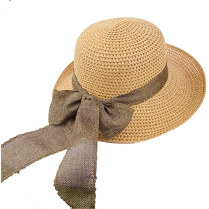 Summer woven straw beach hat with wide brim and brown ribbon bow for sun protection
