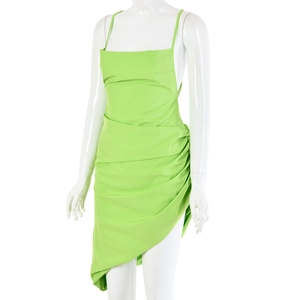 Detail view of light green slim fit dress featuring ruched sides and asymmetric hem
