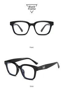 Detail of square black frames with metallic double B logo on side temples