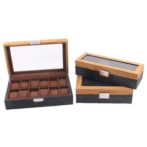 Detail of 12-slot wooden watch box with brown velvet lining and dual-tone grain