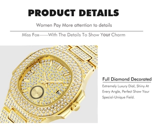 Macro side view of gold iced-out watch showing date window and crystal details