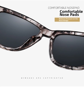 Close-up of comfortable tortoise shell sunglasses nose pad with grey gradient lens