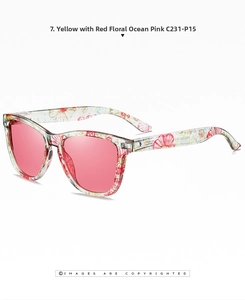 Macro view of floral pattern transparent frame and polarized pink lenses of sunglasses