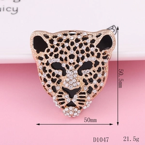 Sparkling crystal encrusted leopard head pendant in gold finish, measures 50mm x 50.5mm