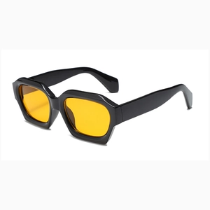 Retro hex sunglasses with thick black plastic frames and vibrant orange lenses