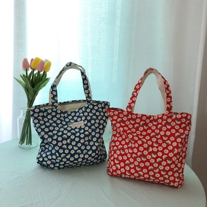 Vintage floral cotton tote bags in blue and red colors with small daisy patterns