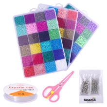 Complete 2mm glass seed bead DIY kit with elastic cord, scissors and metal jewelry findings