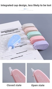 Detail of 6-color macaron correction tape with integrated flip-top lid on a book background