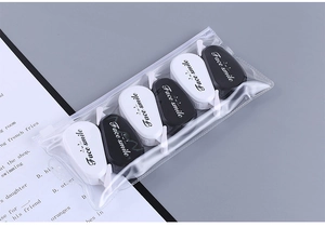 Close-up of 6 mini Morandi correction tapes in black and white colors with zipper pouch