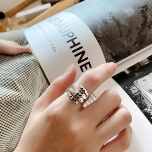Elegant 925 sterling silver multilayer woven ring for women shown on hand