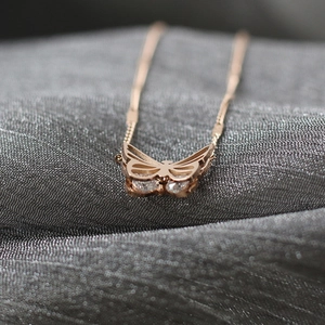 Elegant 18K rose gold plated titanium steel butterfly necklace with sparkling zircon crystals