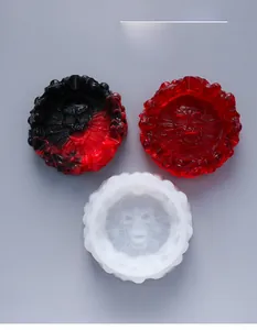 Detailed skull pattern silicone mold for resin ashtray with finished product examples