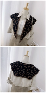 Detail of leopard print knitted shawl scarf showing front and back view on a mannequin