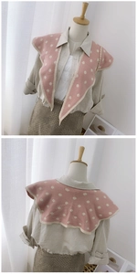 Front and back detail of pink knitted fake collar with white dots and beige trim edges
