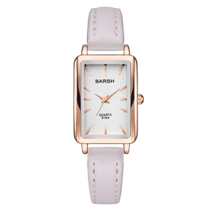 Detail view of rectangular rose gold case and lavender leather strap with clean stitching