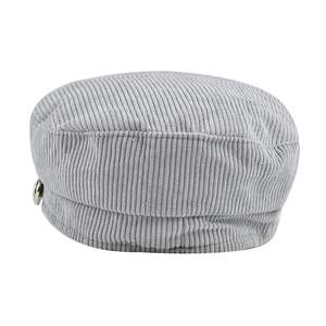 Detail of light gray corduroy baker boy hat showing ribbed texture and metal button