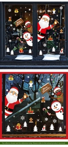 Detail of Christmas window stickers featuring Santa, reindeer and snowman decals