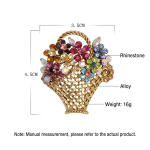 Colorful rhinestone flower basket brooch in gold alloy finish with dimensions 3.5x4.5cm
