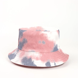 Close-up of pink and blue tie-dye bucket hat with detailed twill cotton fabric texture