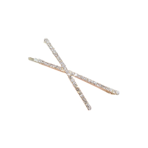 Eleganter X-förmiger Gold-Haarclip mit funkelnden Strasssteinen auf weißem Hintergrund